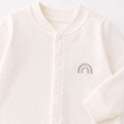 Rainbow Snuggle Baby Romper - Close-up of rainbow embroidery and snap buttons